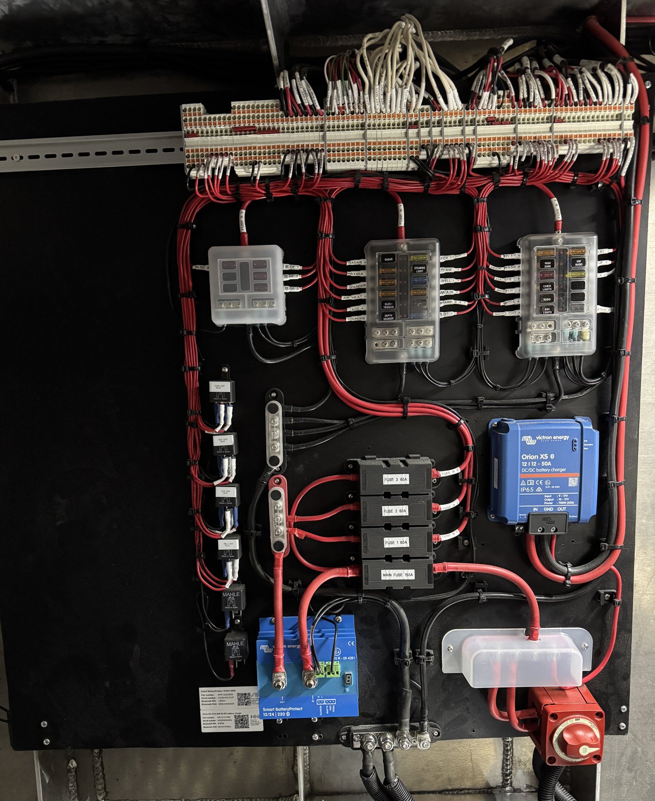 Custom marine 12V distribution board with Victron power management, fitted by Tide & Volt